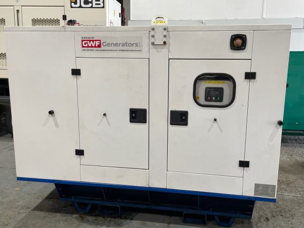 A white generator in a workshop