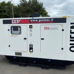 A white genmac generator in a yard